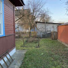 ​В 3-х квартирном деревянном жилом доме с отдельным входом продается квартира по ул. Огородняя, д. 8А в Пинске
